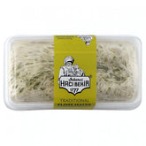 A clear plastic container of Haci Bekir - Pismaniye Floss Halva with Pistachio (200g), showing fine strands of traditional Turkish halva and a yellow label with the brand logo.